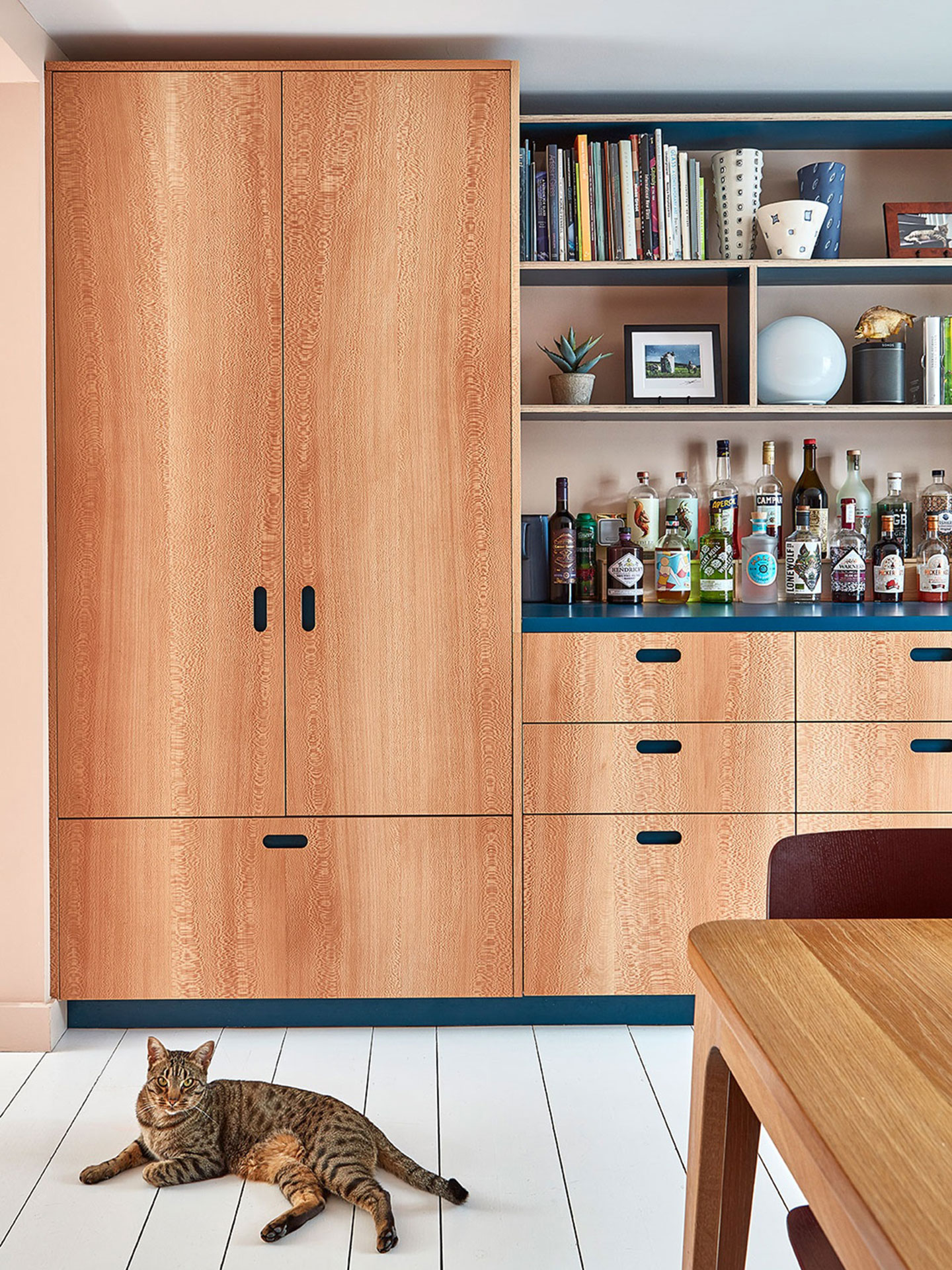 London Plane wood and blue galley kitchen in an Islington Townhouse.