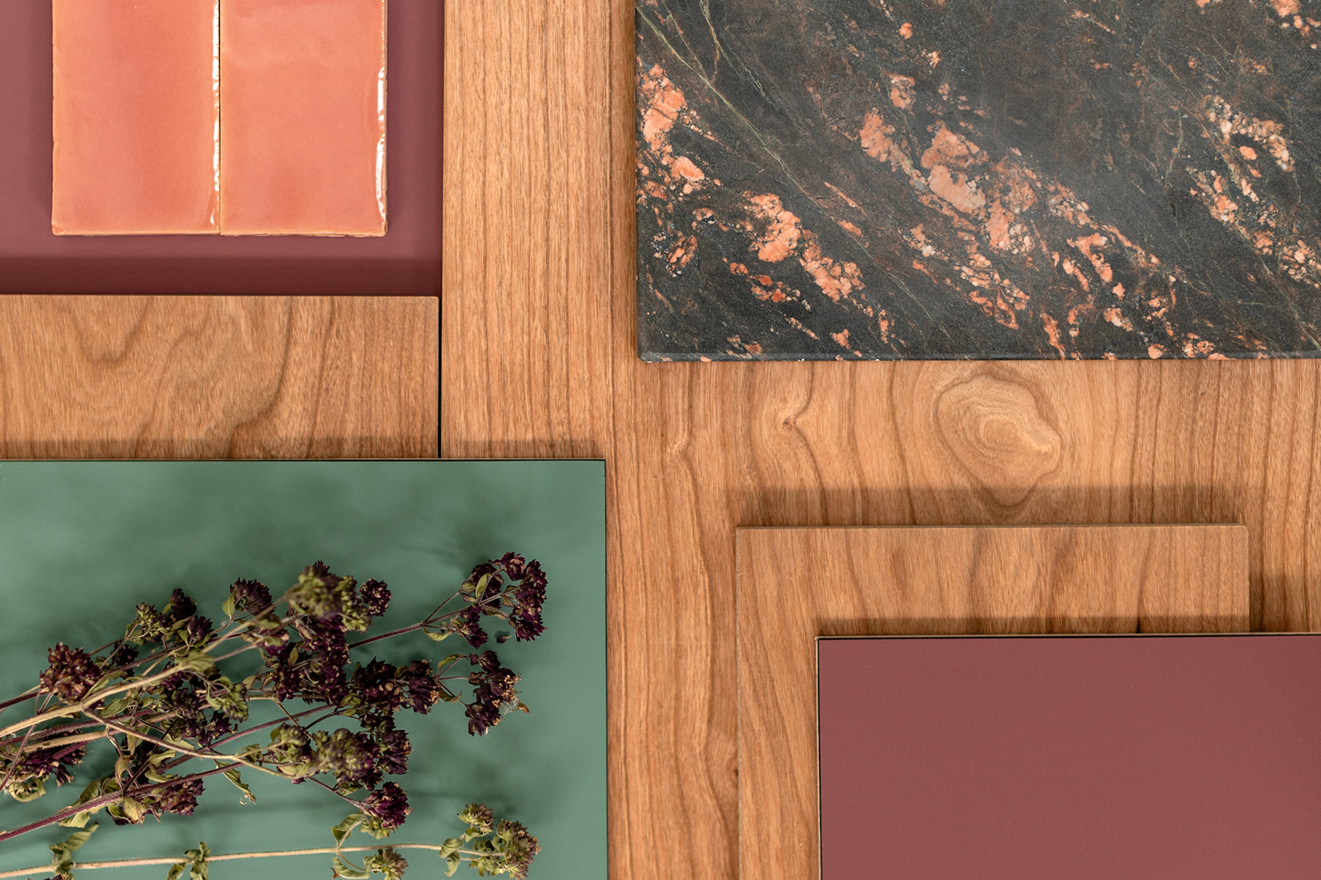 Kitchen colour inspiration including greeny-blue and raspberry red fenix, Cherry wood, pink tiles, quartzite and flowers.