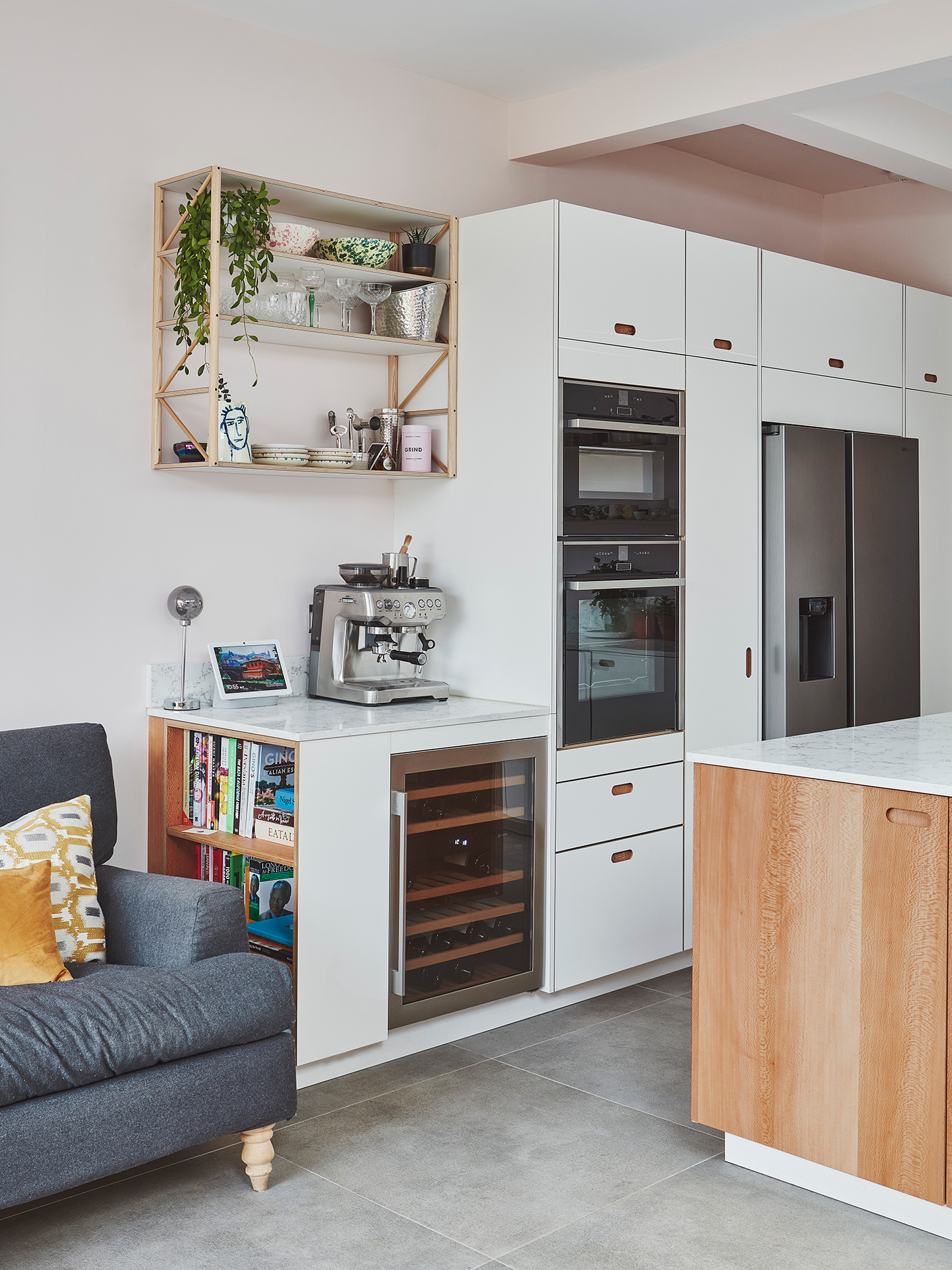 Wood island and white cabinetry kitchen inspiration in Wandsworth.