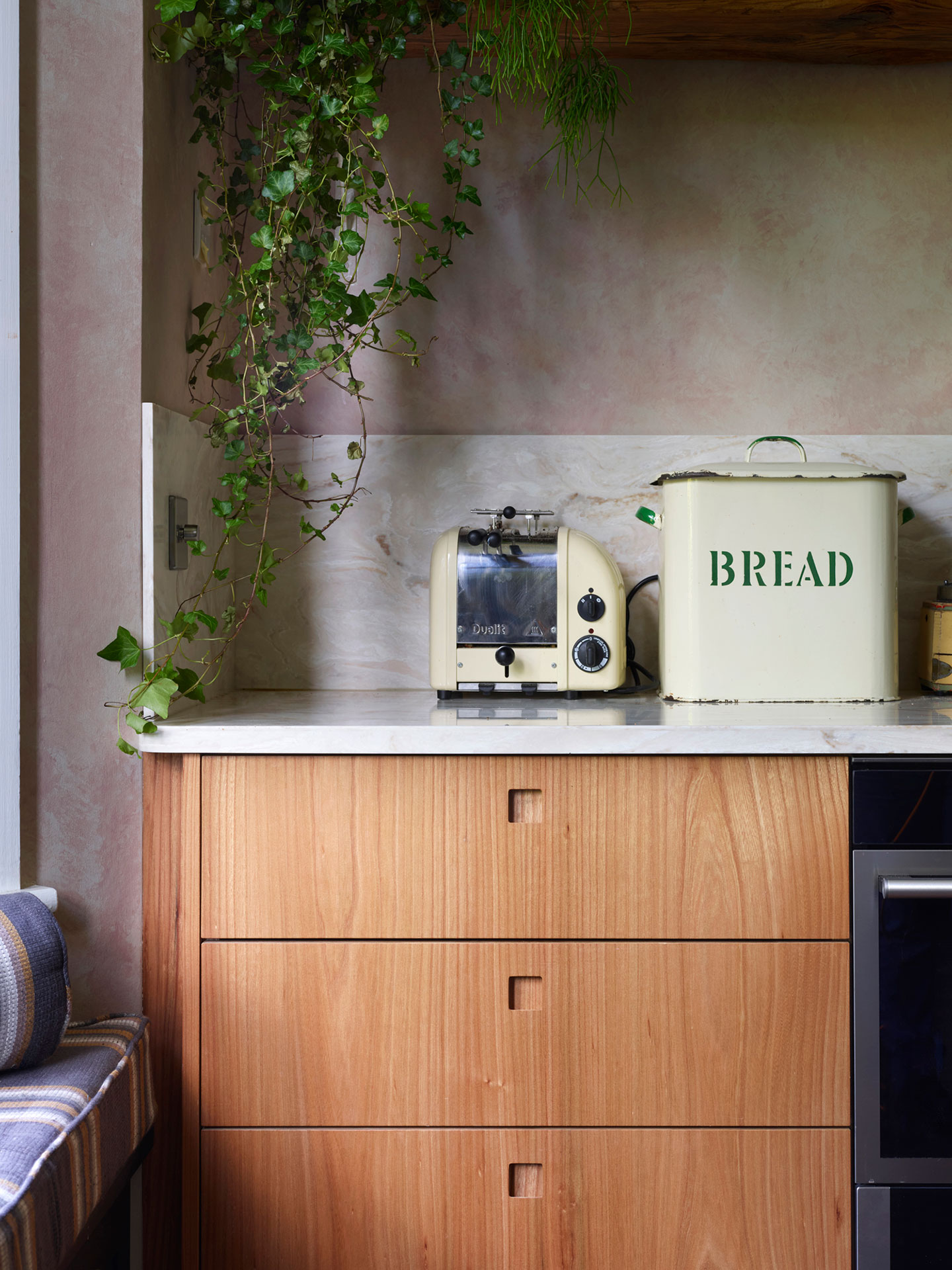 Kitchen mixing old and new with Pluck's cabinets and a freestanding vintage table island.