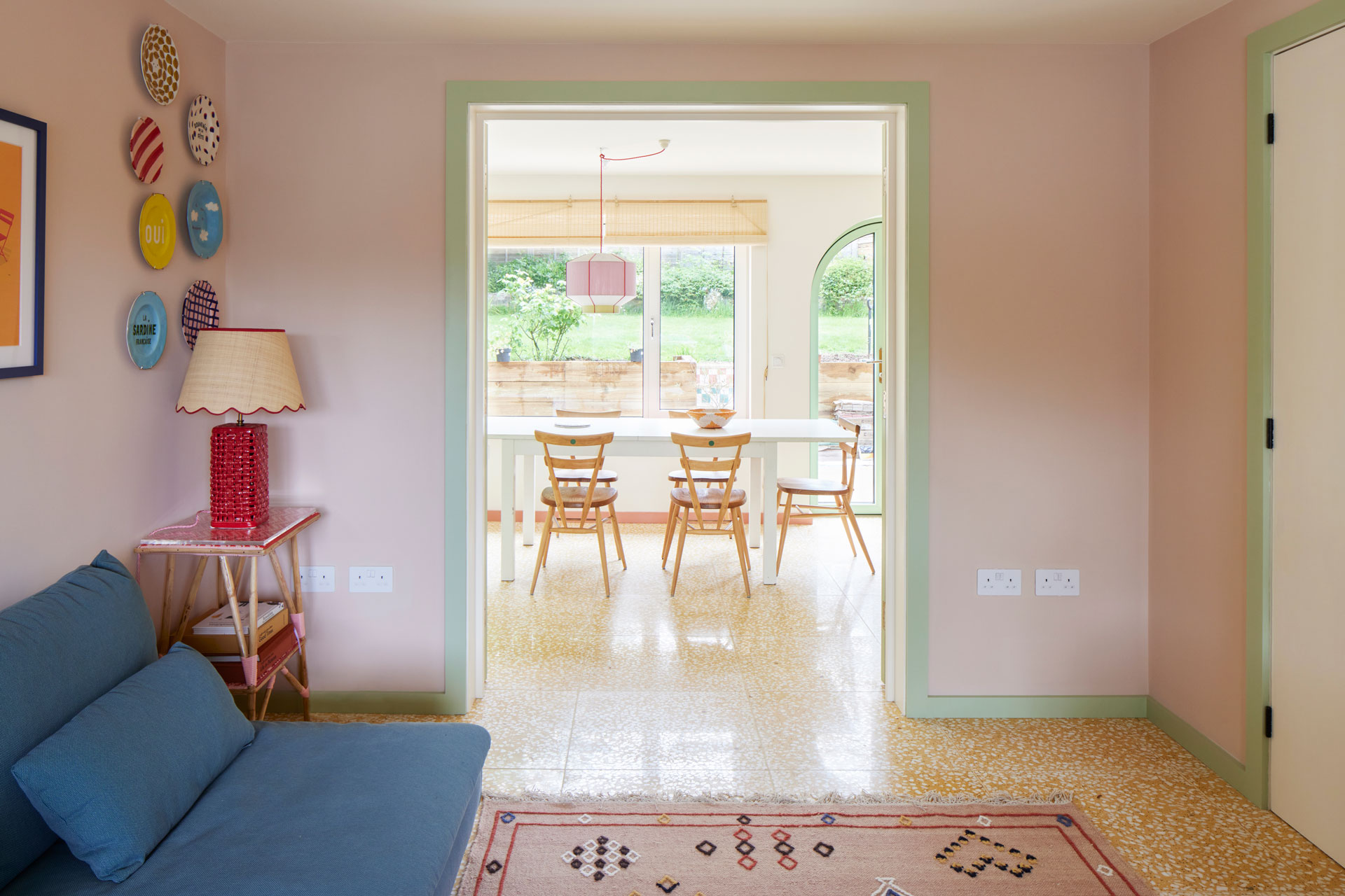 Colourful dining area with garden views.