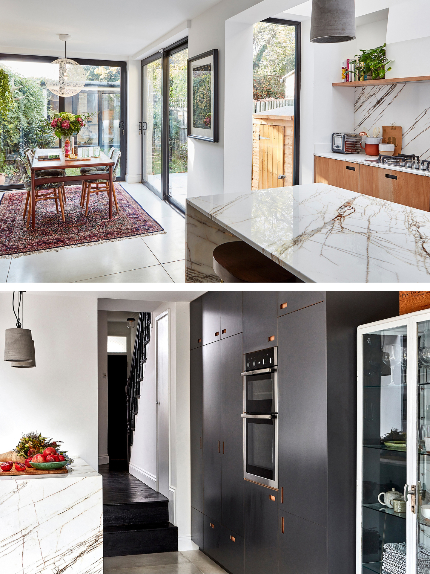 An open plan kitchen with a mix of wood and grey cabinetry, marble worktops and a cosy dining area.