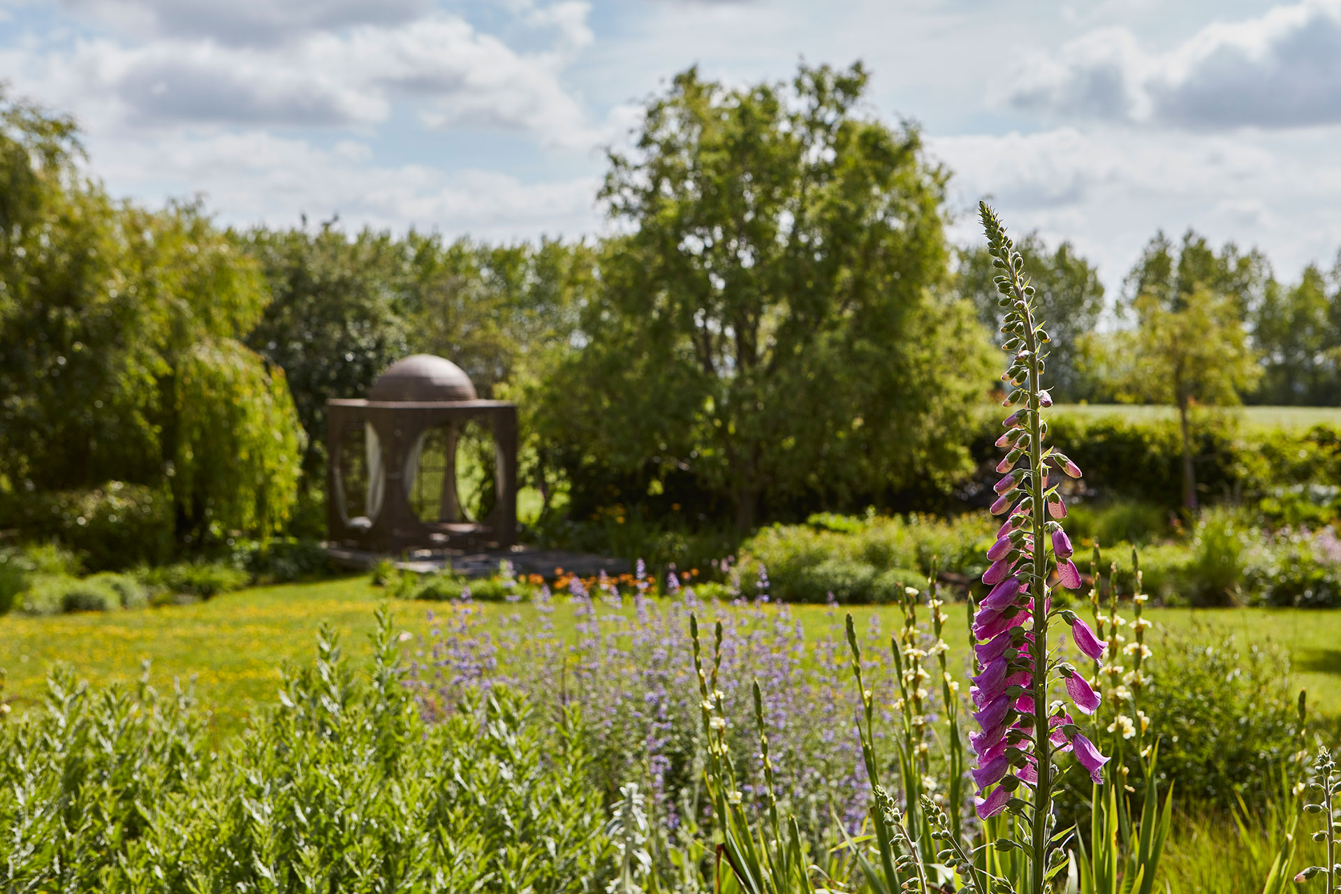Landscaped garden with views across the Kent countryside.
