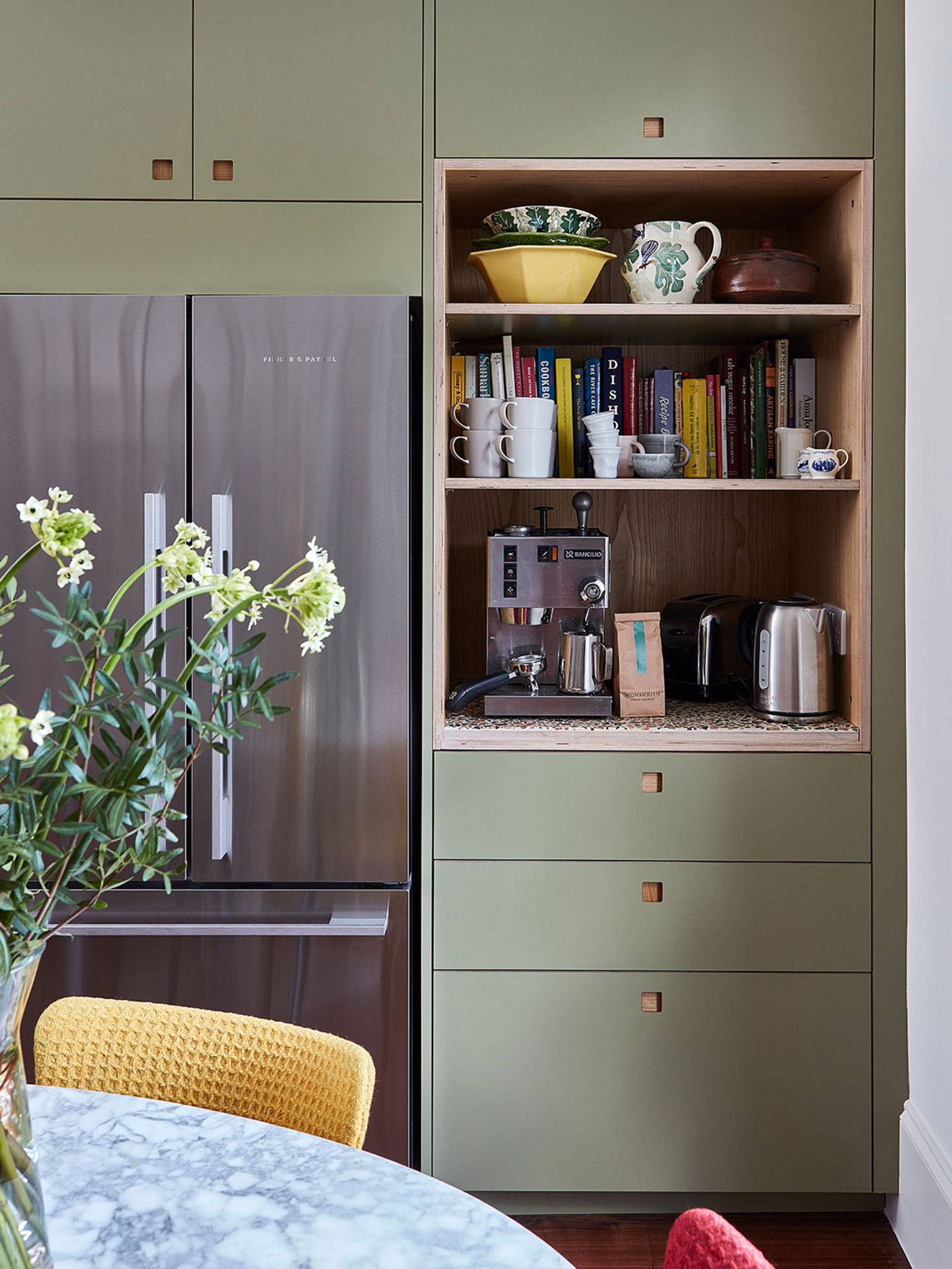 Green galley Pluck kitchen inspiration with wood floor and terrazzo.