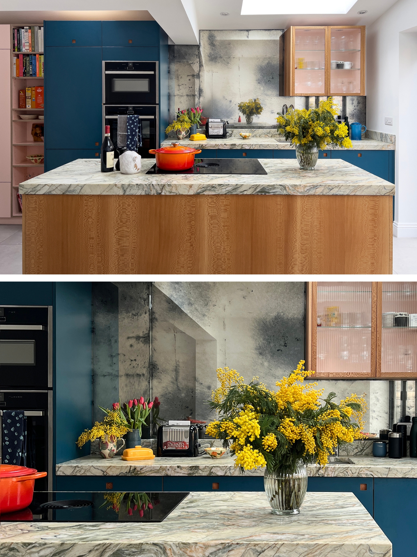 Rich blue, London Plane wood and pink cabinetry topped with chunky swirling green quartzite and an antiqued mirror splashback.