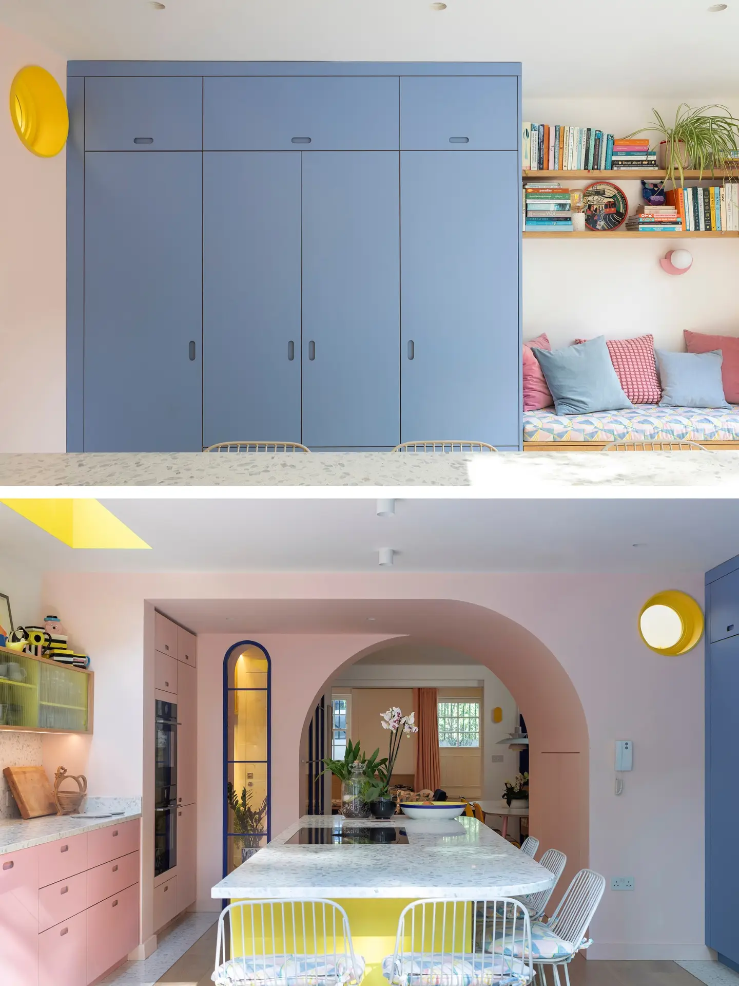 Family kitchen with a playful colour scheme including pink, blue and yellow cabinetry with curved walls, windows and island terrazzo worktop.