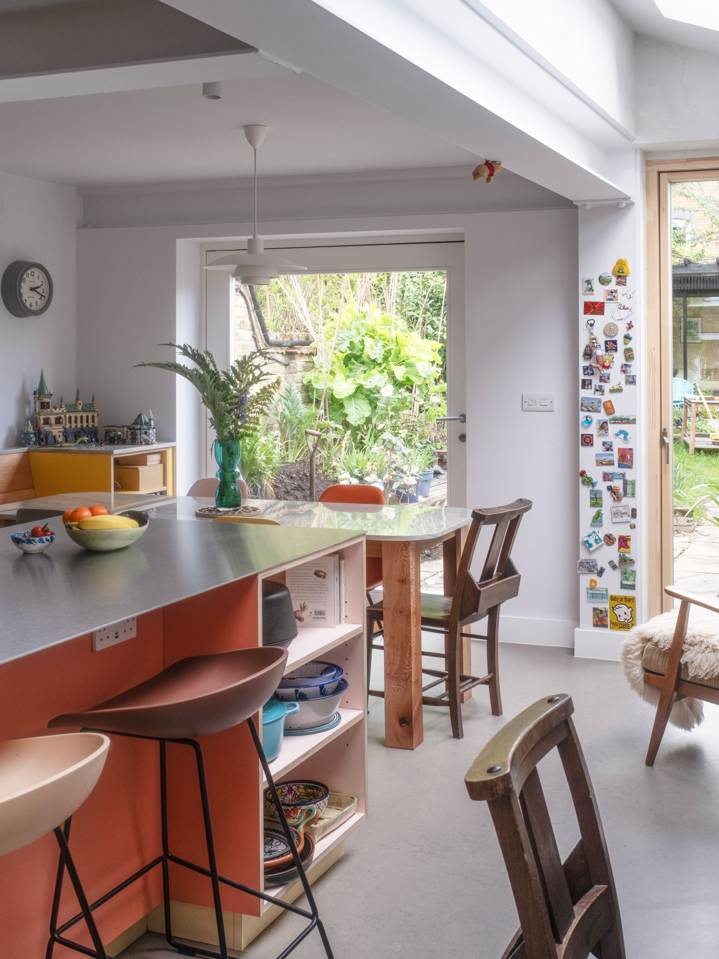 A Grade II listed family home in East London home with a Pluck kitchen including three colours and wood.