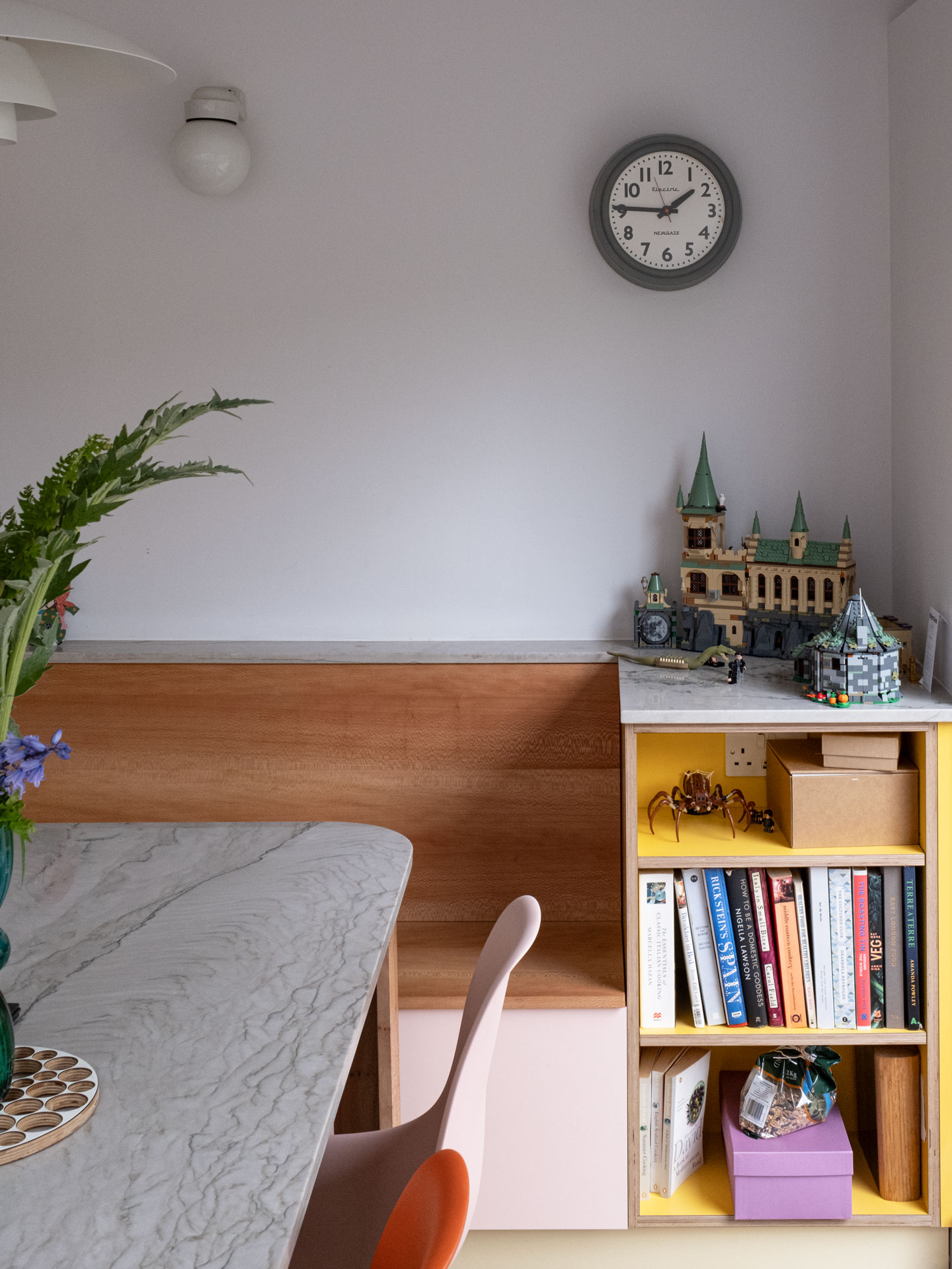 A Grade II listed family home in East London home with a Pluck kitchen including three colours and wood.