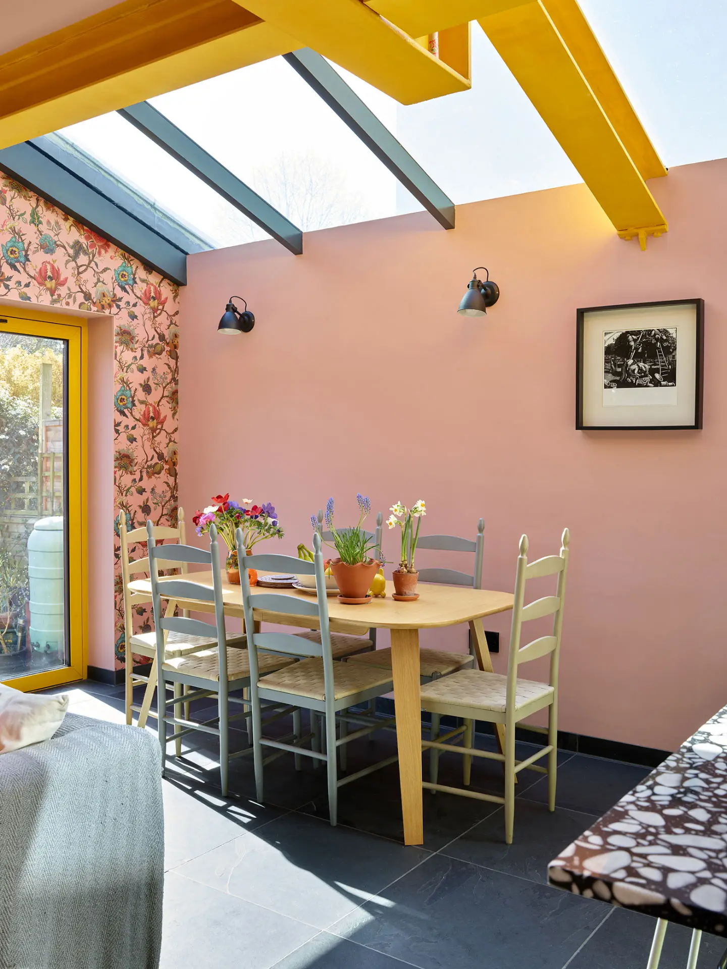 A colourful London kitchen with Pluck's cabinetry in an open plan room that is fun, cosy, calming and inviting.