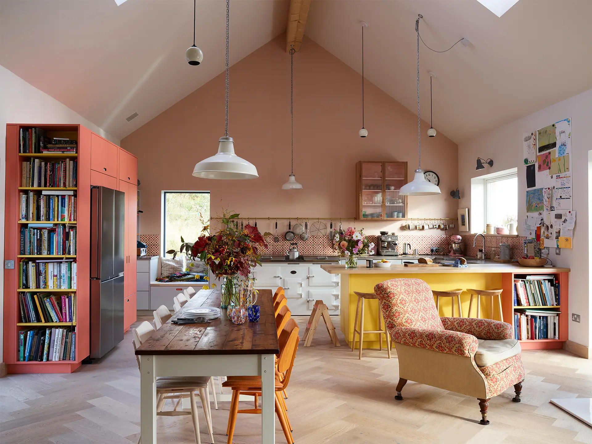 Colourful Pluck kitchen in Birmingham with a large island in the centre.