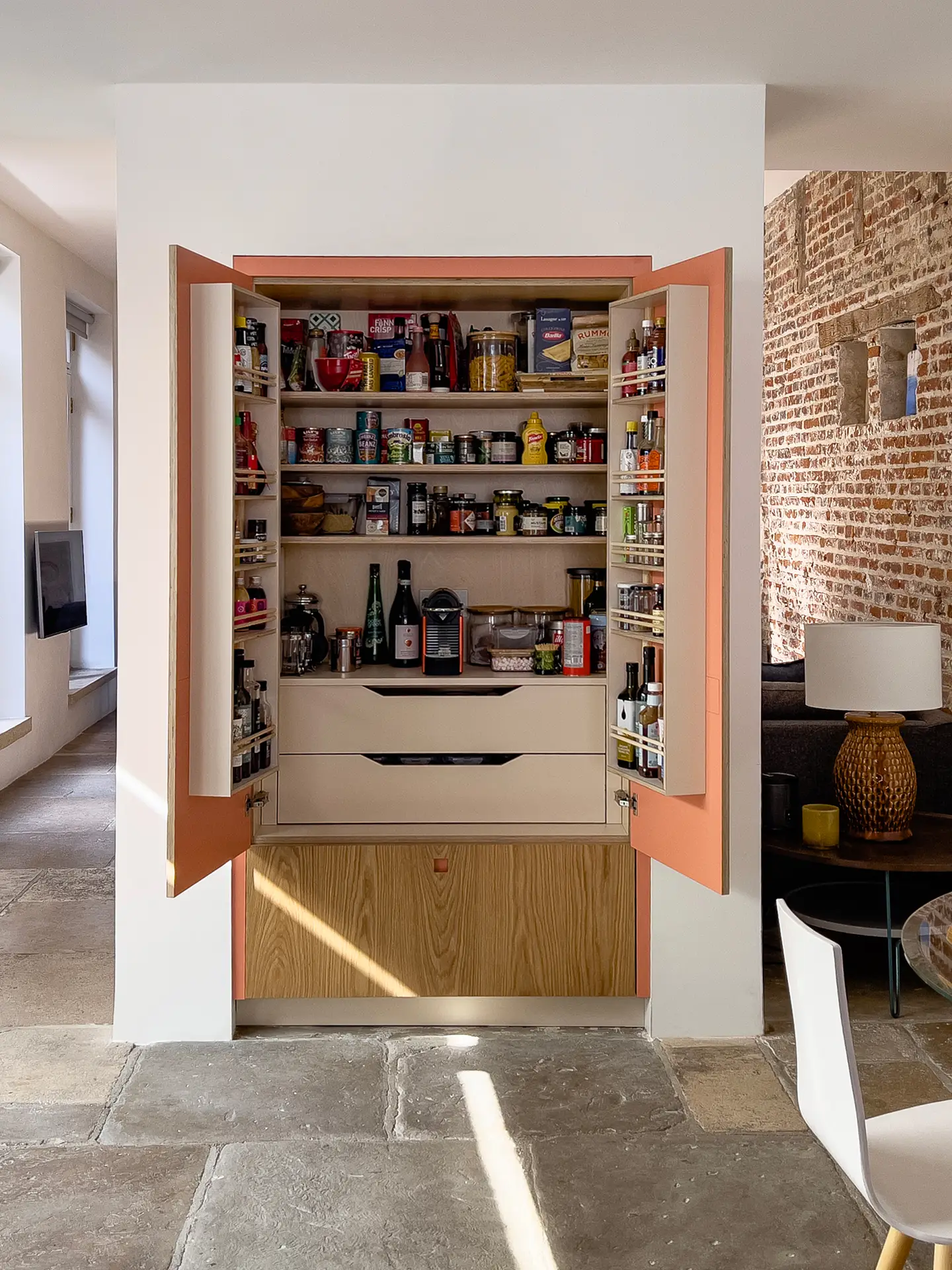 Pluck Kitchen larder cupboard built into a wall.