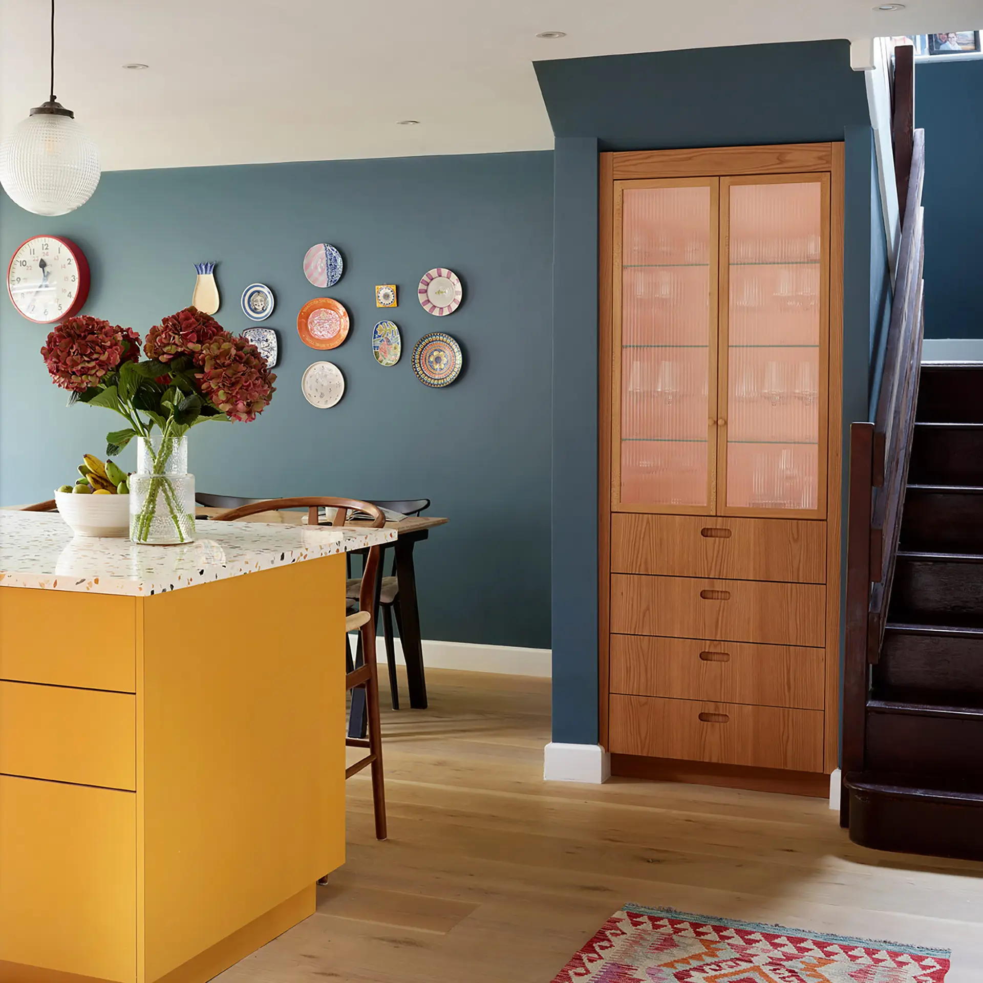 Built-in cupboard under a staircase.
