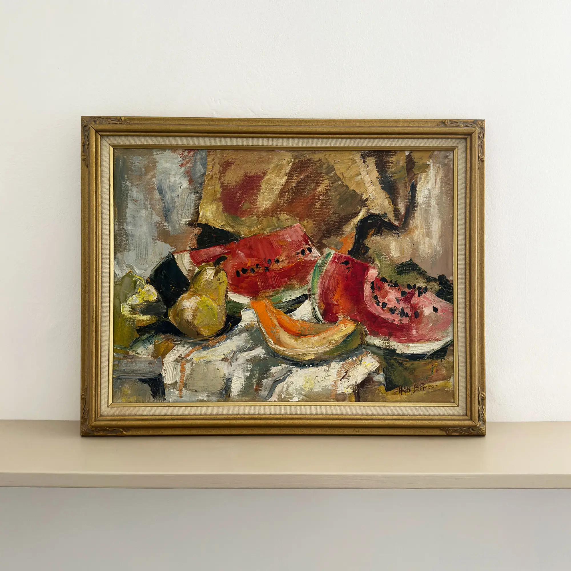 A fruity feel colourful still life painting with melons in a wooden frame with linen detail.