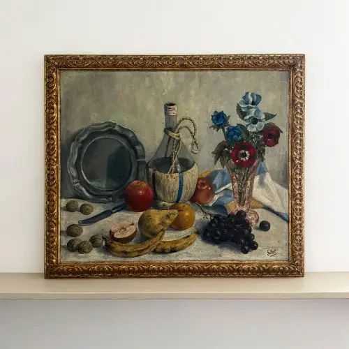 Large French still life painting with fruit, flowers, a decanter and plate, framed in gold