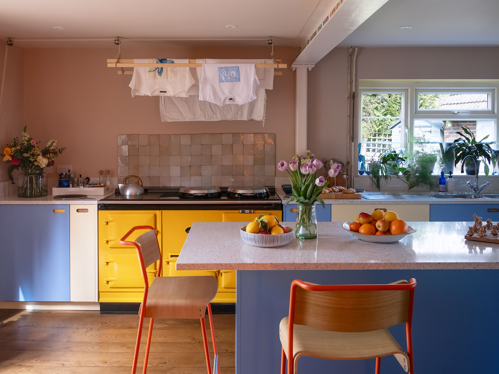 A kitchen in Haywards Heath packed with colour, including Milton Blue and two Pluck yellow hues.