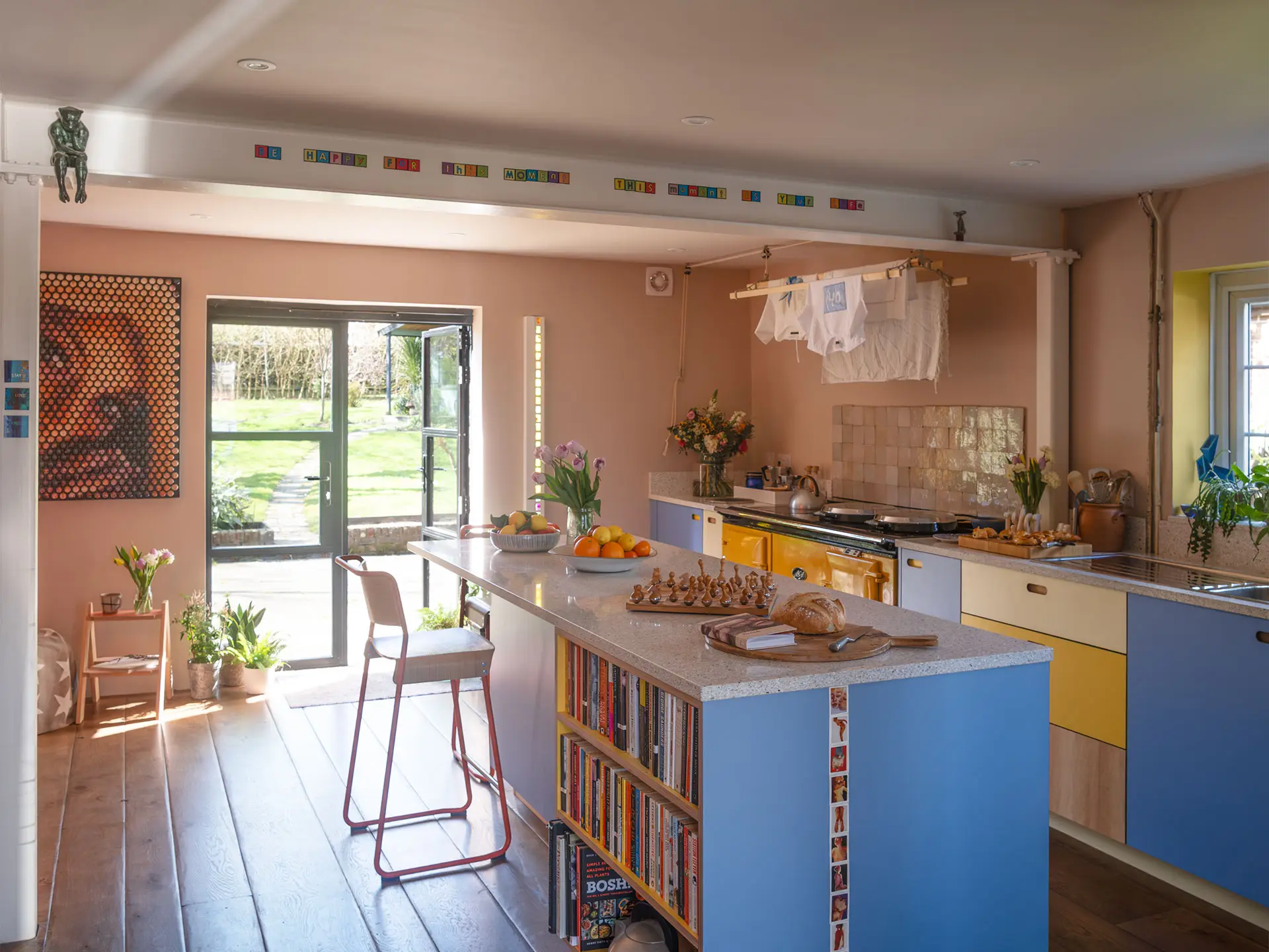 A kitchen in Haywards Heath packed with colour, including Milton Blue and two Pluck yellow hues.